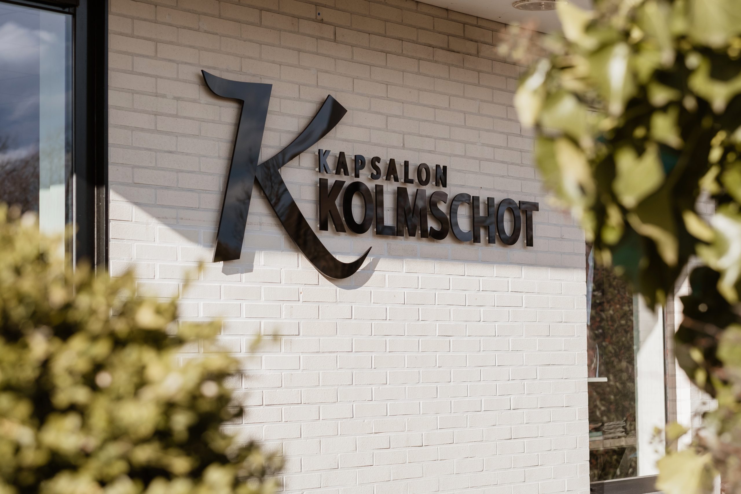 Sfeerafbeelding buitenkant gevel Kapsalon 